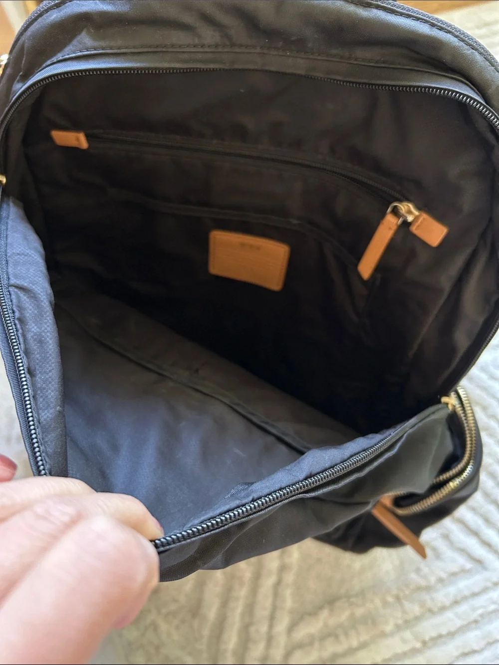 Women’s tumi Backpack with Tan Trim